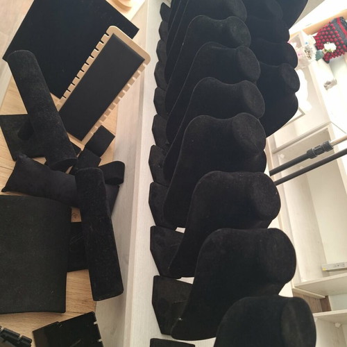 Velvet jewelry display set with 15 small and 1 large necklace stands