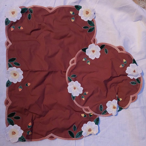 Embroidered table linens used, brown set