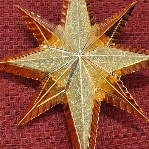 Embossed gold-tone Christmas tree star topper
