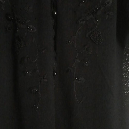 Summer blouse with intricate decoration