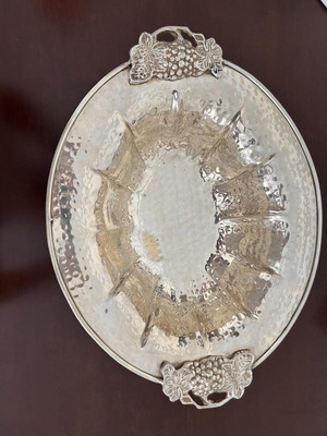 Hammered deep decorative platter silver color with grape cluster handles like new