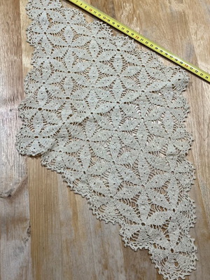 Oval beige table linen with flower and windmill patterns like new