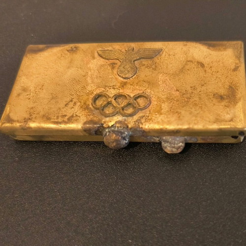 Vintage brass cigarette case from 1936 Olympics, used