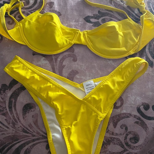 Luigi swimsuit size S yellow, unused