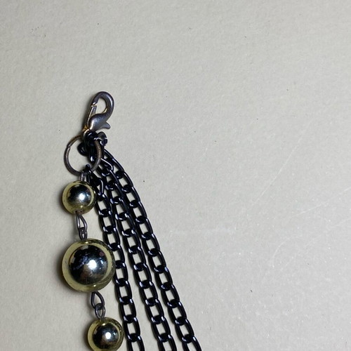Quadruple necklace like new with three chain rows and beads