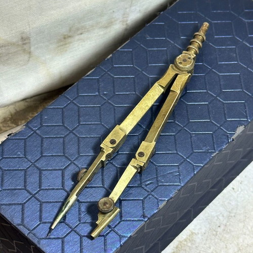 Vintage brass adjustable compass for drawing and cartography used