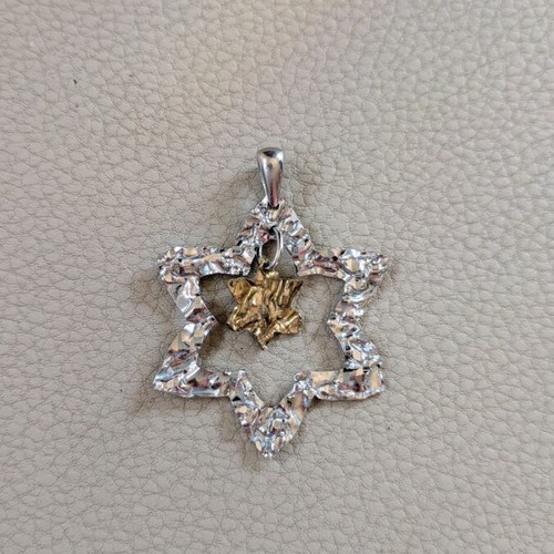 Silver pendant like new with gold and silver star