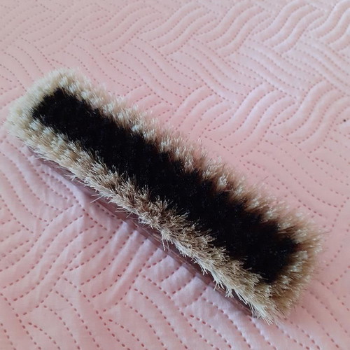 Old clothing brush, souvenir