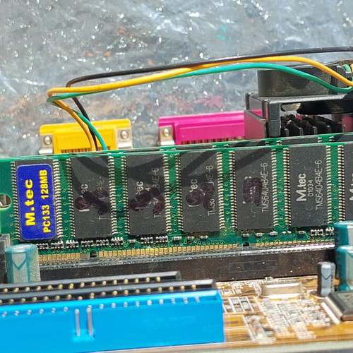 Vindage motherboard with Celeron processor and 3 memories