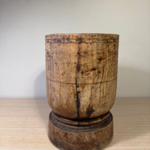 Rustic handmade wooden mortar used