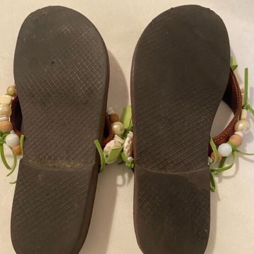 Leather slippers like new, decorated with beads and green ribbons, size 36