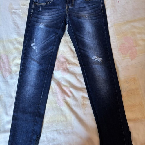 Dark blue skinny jeans with black lace and distressed details, size S, like new
