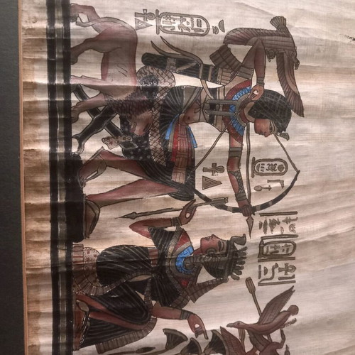 Egyptian papyri used in frame