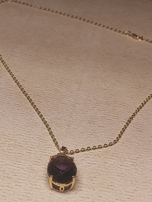 Women's necklace with purple stone