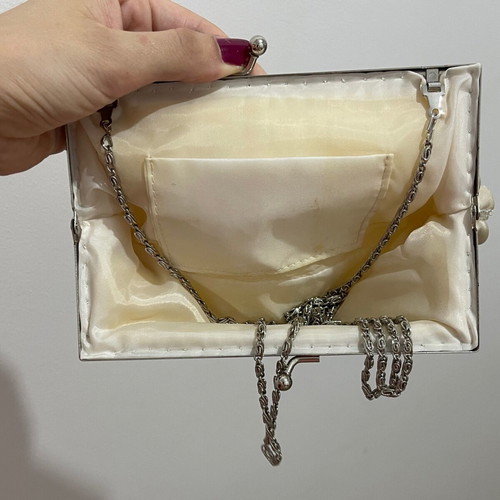 Clutch golden like new with long straps