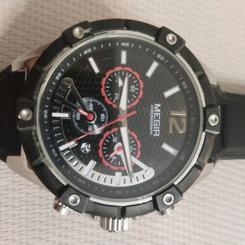 Megir watch used with scratch, battery replacement needed