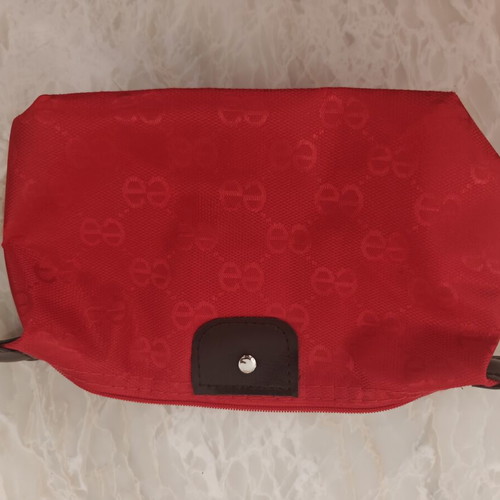 Red embossed cosmetic bag with brown details new