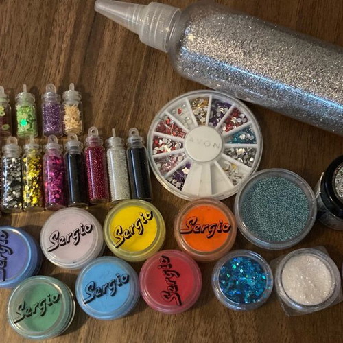 Nail products pack like new with Sergio powders and glitter