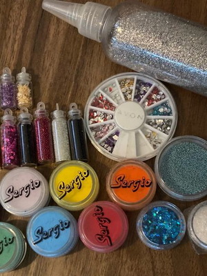 Nail products pack like new with Sergio powders and glitter