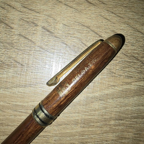 Wooden pen used with blue ink