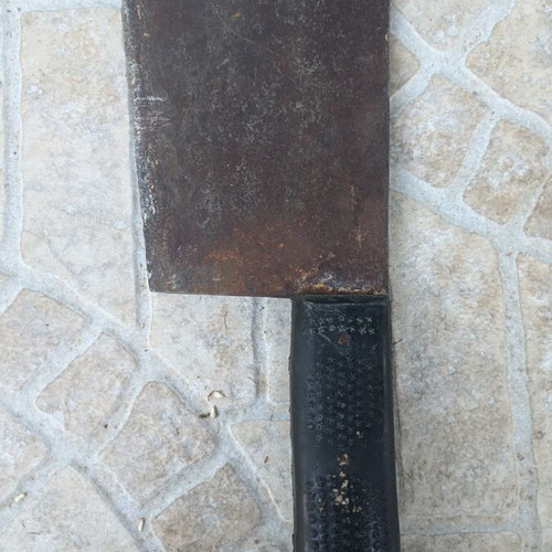 Vintage butcher cleaver with black synthetic handle