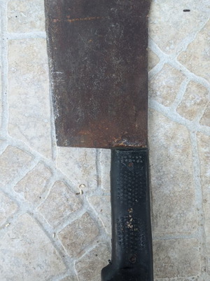 Vintage butcher cleaver with black synthetic handle