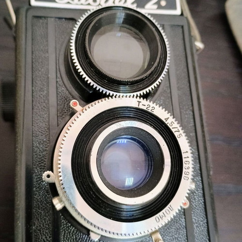 Lubitel 2 camera used with black leather case