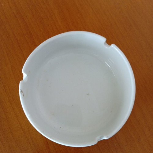 Ionia porcelain ashtray used, 11.5 cm diameter