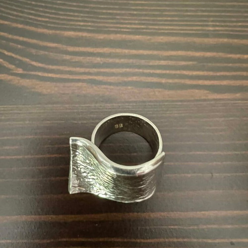 Silver adjustable ring like new with hallmark