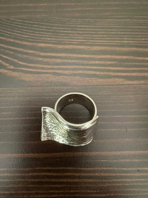 Silver adjustable ring like new with hallmark