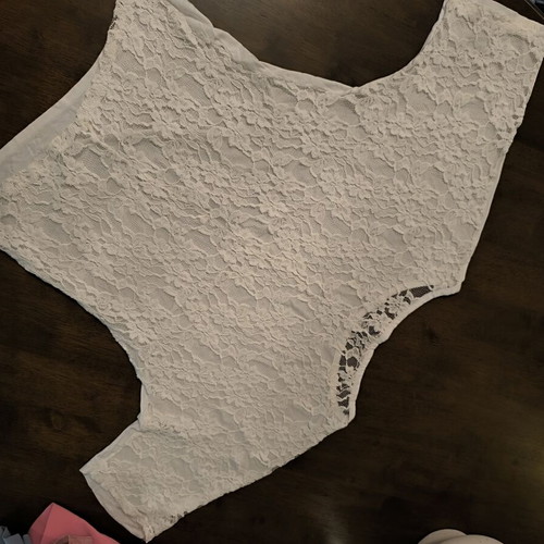 White top with lace back like new, sizes S-M