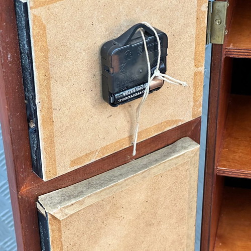 Decorative floor clock used with cabinet