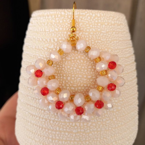 Handmade earrings with champagne flowers and red polyhedral beads