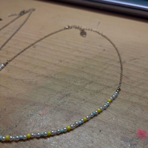 Necklace set of three gold-colored like new with adjustable clasp
