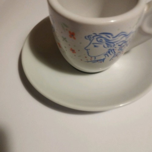 Loumides set of 8 cups with 8 saucers like new