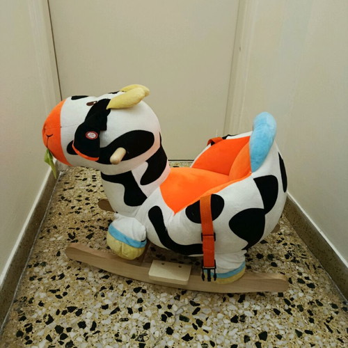 Skorpion Wheels Rocking Cow like new with sounds and wooden base