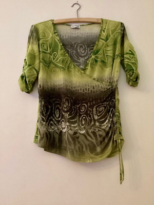 Genesis wrap blouse with green tribal print size M like new