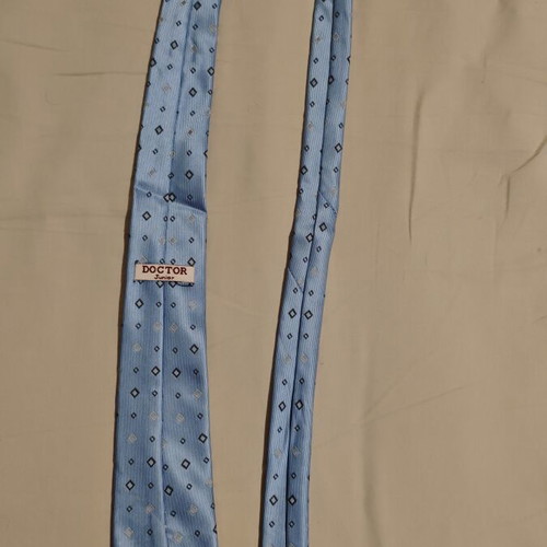 Children's tie light blue with diamond patterns like new