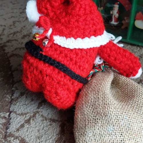 Handmade knitted Santa Claus with candy sack new