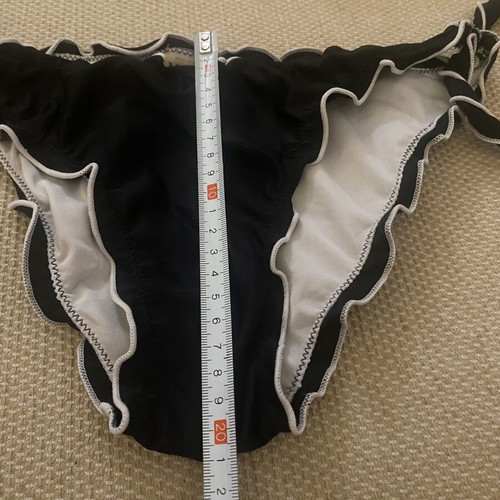M&D black swimsuit used, fits small and medium sizes