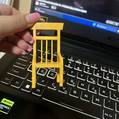 Miniature yellow chair used