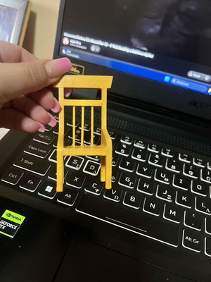 Miniature yellow chair used