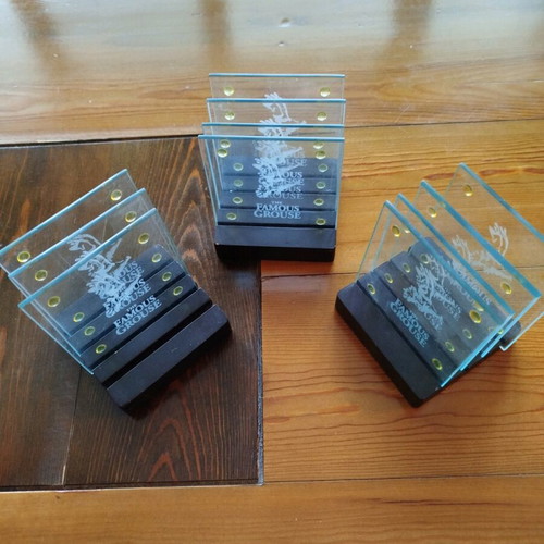 Famous Grouse glass coasters set like new, 11 pieces