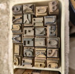 Large brass typography and bookbinding elements