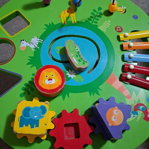 Wooden activity table used for preschool children
