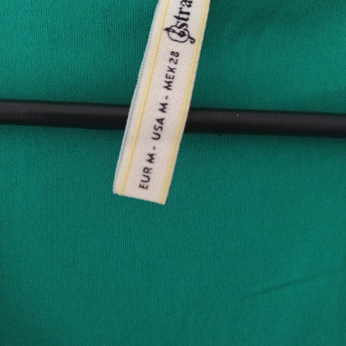 Short green dress with pockets used, size M