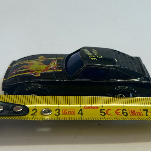 Vintage Black Datsun Wild Horse toy car used