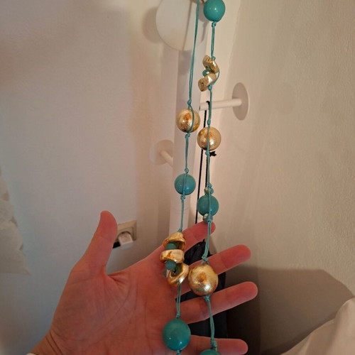 Necklace new with turquoise and gold stones