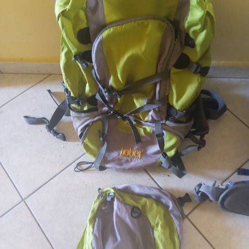 Backpack Kober used, top flap detached needs sewing
