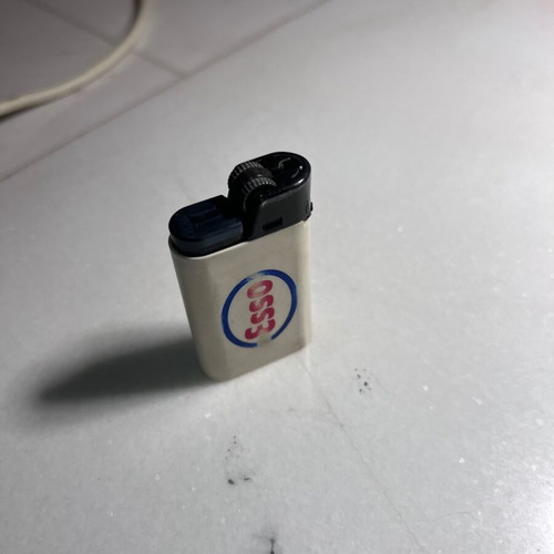 Esso promotional lighter used with synthetic fur tail